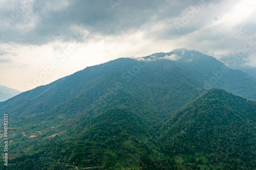 mountain range with cloudy sky at morning from flat angle