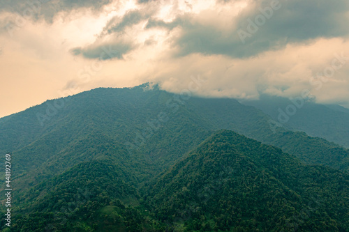 mountain range with cloudy sky at morning from flat angle