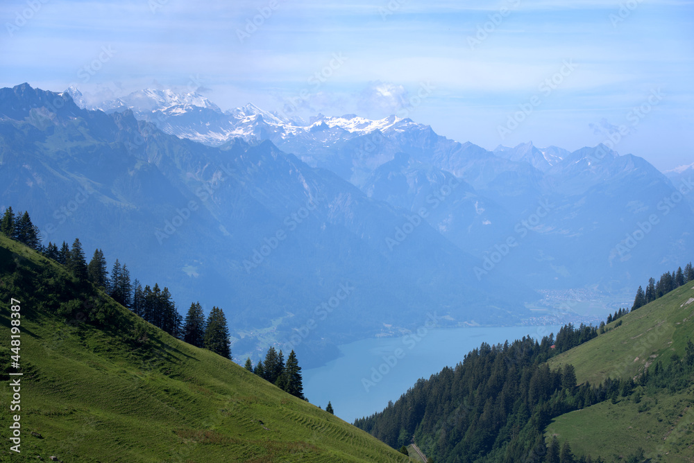 Panoramic view of Swiss alps at Bernese Highland on a beautiful sunny summer day seen from Brienzer Rothorn. Photo taken July 21st, Flühli, Switzerland.