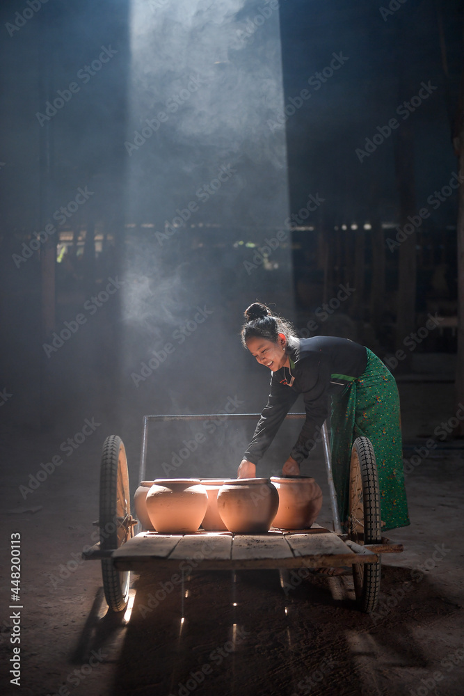 potter making pot in pottery workshop