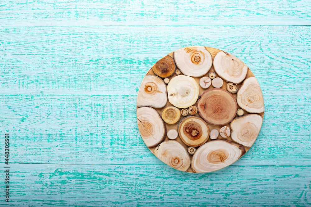 Cutting board for cutting bread, pizza or steak on a wooden background.