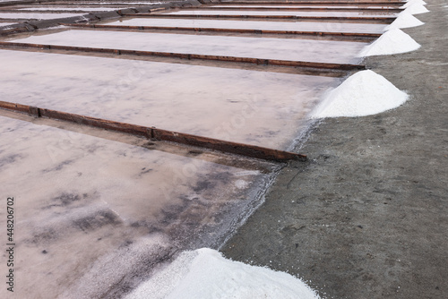 Sea salt in evaporation pools with pastel shades. photo