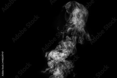 Fototapeta Naklejka Na Ścianę i Meble -  Perfect mystical curly white steam or smoke isolated on black background. Abstract background fog or smog