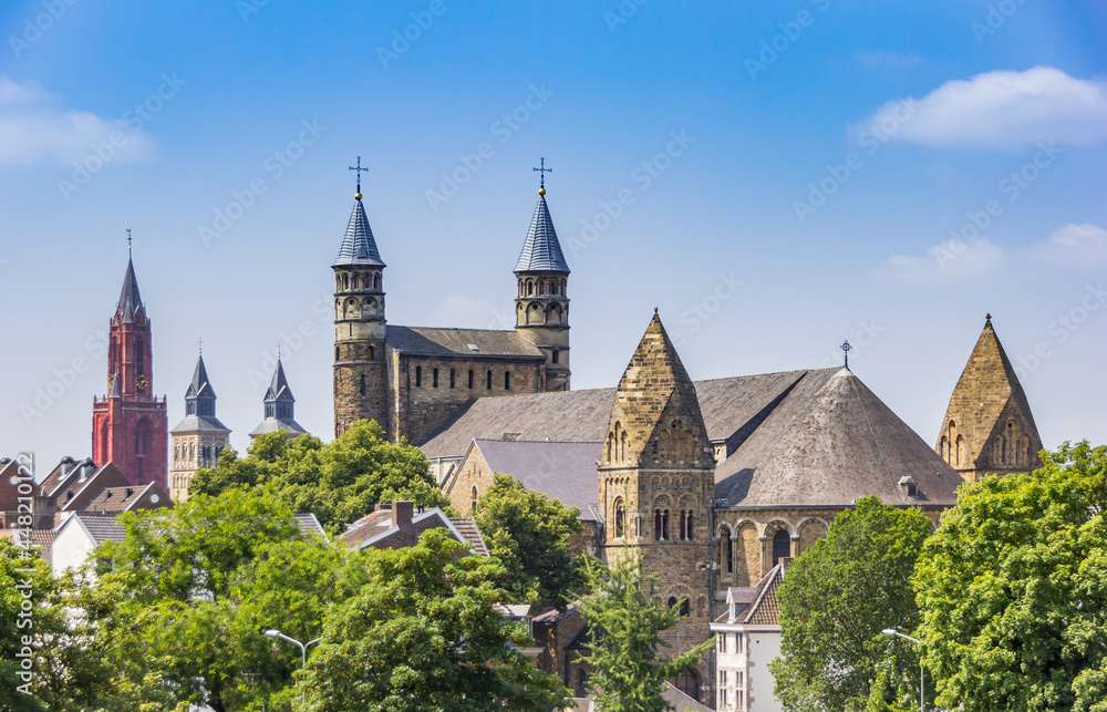 Towers of historic churches in the skyline of Maastricht, Netherlands