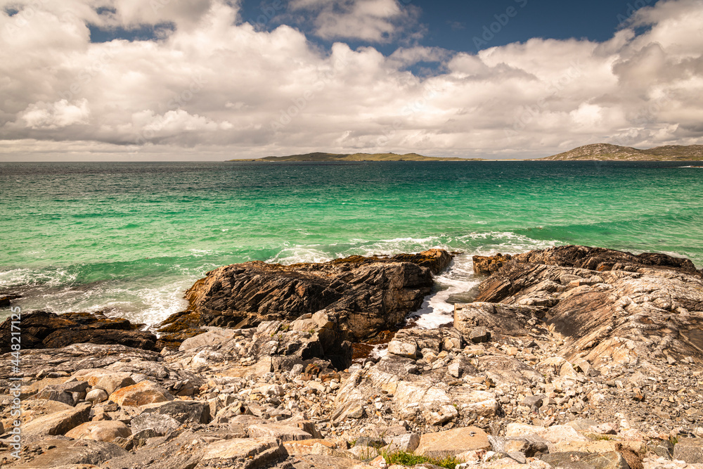 A summer 3 shot HDR image on the Atlantic Ocean emptying on the west coast of the Isle of Harris, Western Isles, Scotland