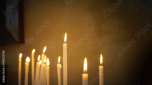 some typical candles in a church with space for your text