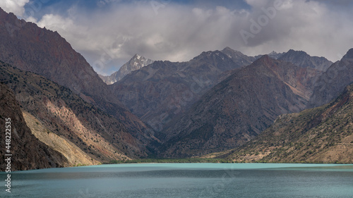 Scenic mountain landscape view around turquoise blue Iskanderkul lake, Fann mountains, Sughd, Tajikistan