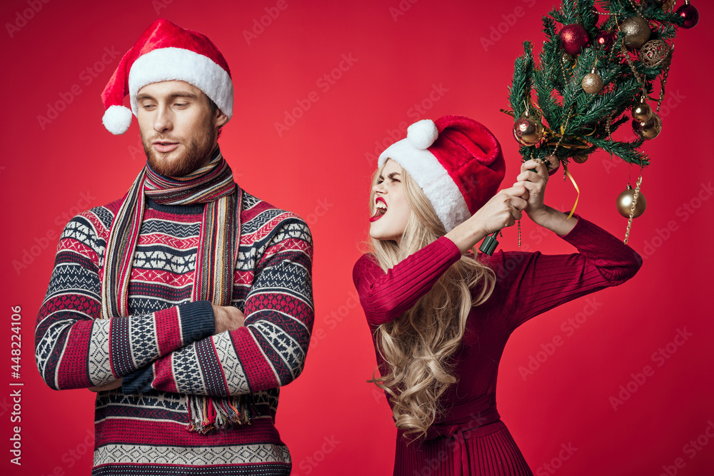 man and woman in holiday christmas fun decoration toys man and woman in holiday christmas fun decoration toys