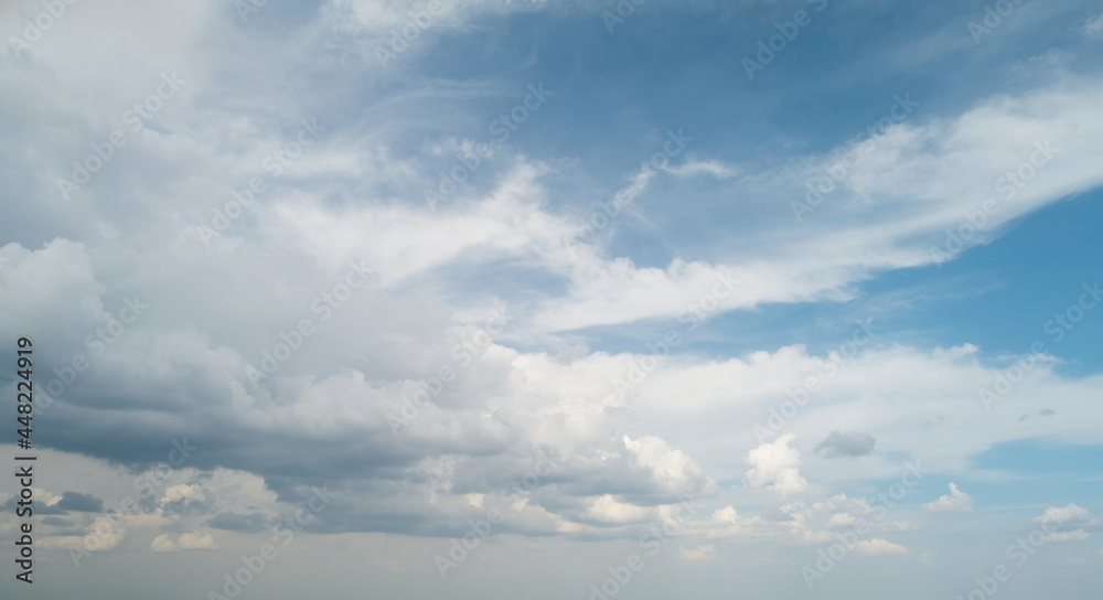 Grey color clouds come to blue sky Grey color clouds come to blue sky