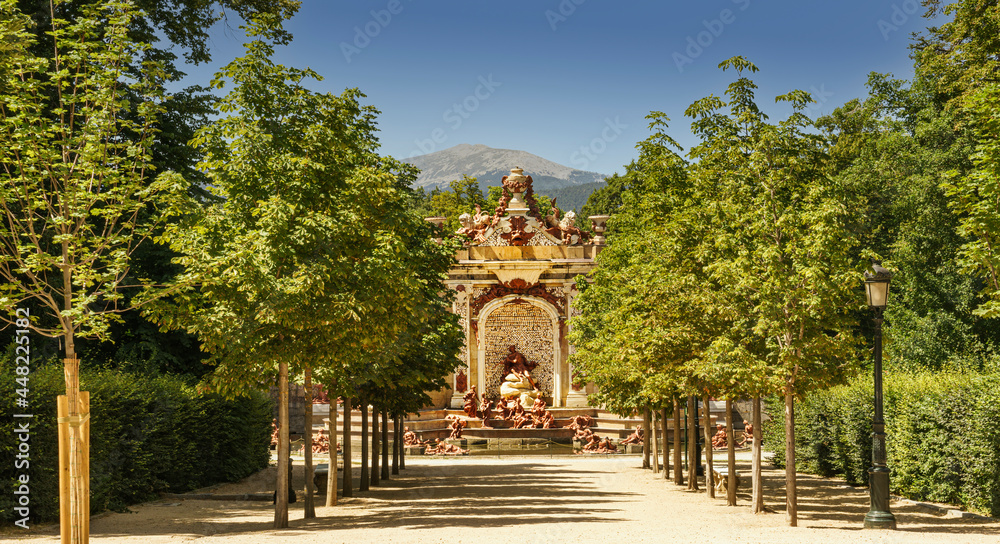  Panoramic view of the promenade in the gardens of the Royal Site of San Ildefonso palace with the baroque fountain of Diana in the background.