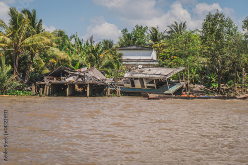 Destroyed house on the river bank. Mekong River in Vietnam, South East Asia. Vung Tau, Vietnam