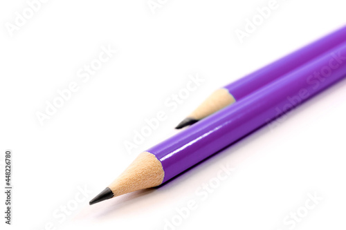 Two Violet Pencils on white background. stationery. Office tool. Back to school.