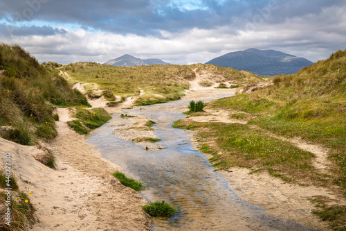 A summer 3 shot HDR image of the footpath to the popular Luskentyre, Losgaintir, beach on the Isle of Harris, Western Isles, Scotland. 