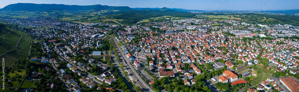 Aerial view of the city Metzingen in Germany on a sunny day in Spring