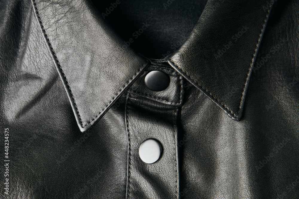 Black leather fabric textile material texture pattern macro blur background. Black leather fabric textile material texture pattern macro blur background.