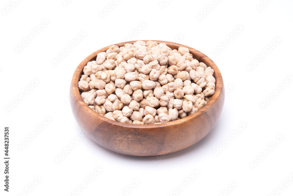 Uncooked chickpea in wooden bowl isolated on white background. healthy food