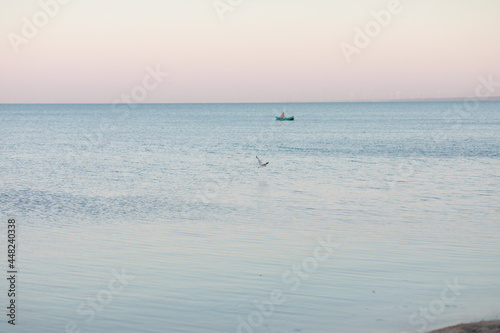 ocean close-up with transparent water on the sandy shore