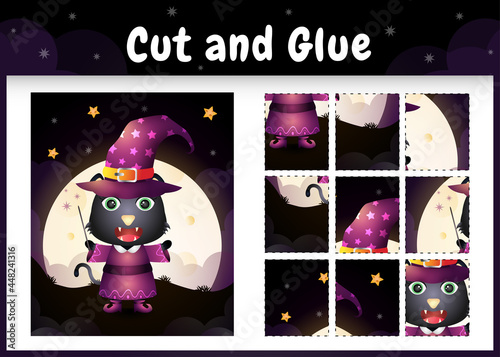 Children board game cut and glue with a cute black cat using halloween costume