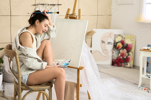 Young female artist waiting...
