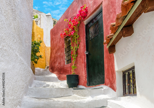 Fototapeta Naklejka Na Ścianę i Meble -  Old narrow street in Anafiotika, Plaka district, Athens, Greece, Europe
