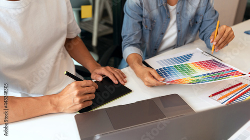 both coworkers designing some products choosing the appropriate shade