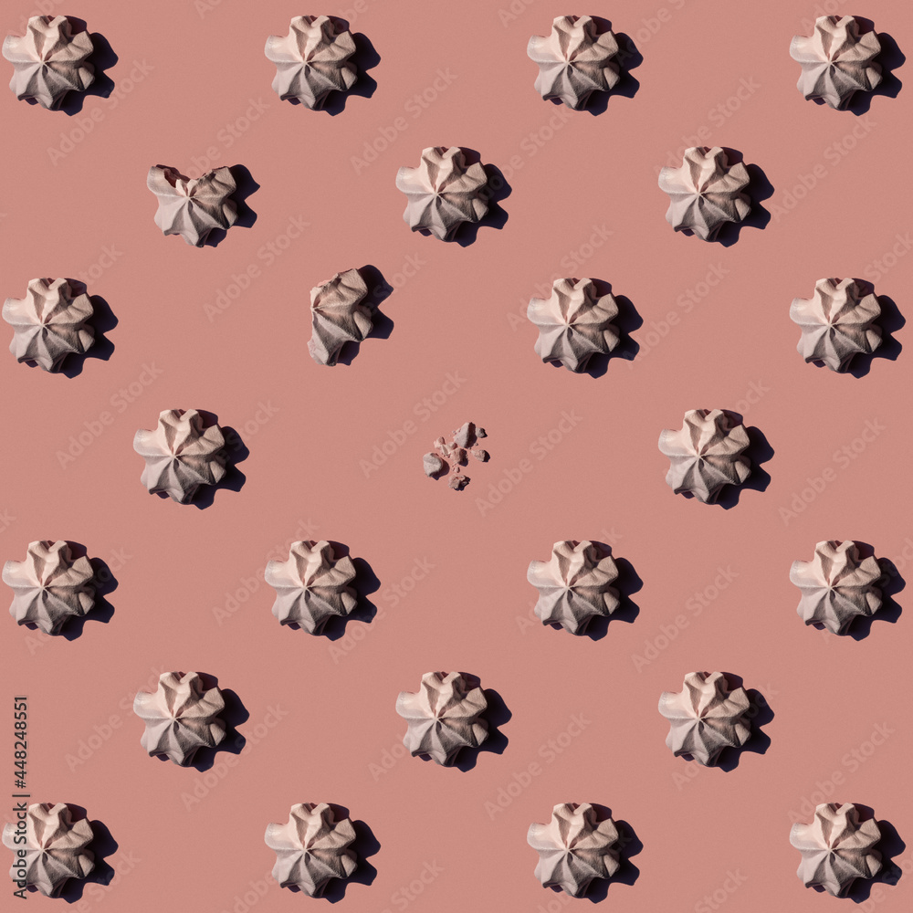 Pattern of meringues on pink background