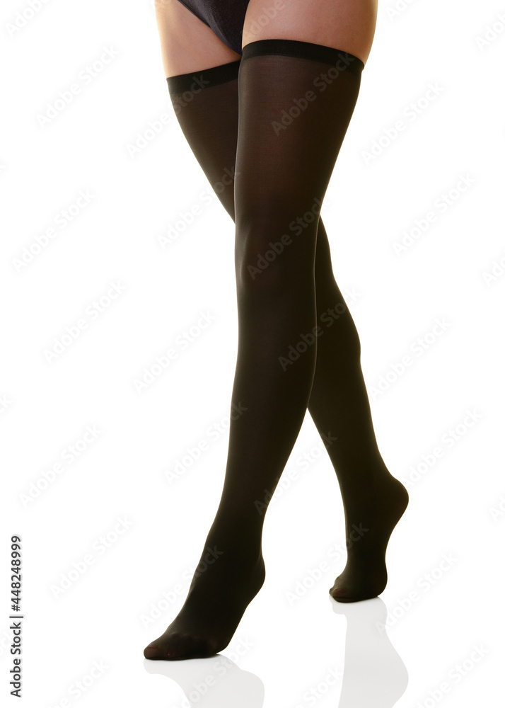Womans Legs in Black Stockings, Close Up, Cut Out Womans Legs in Black Stockings, Close Up, Cut Out