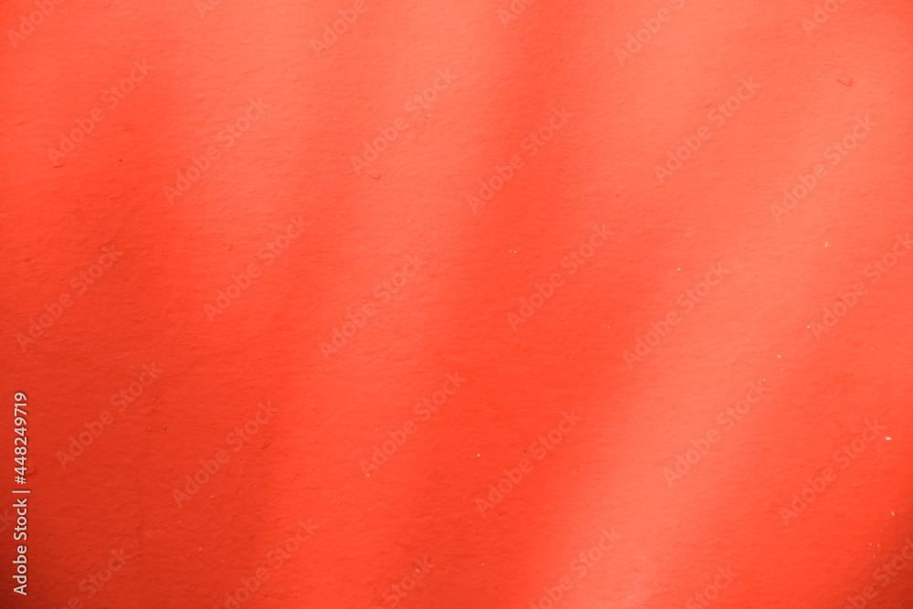 Fototapeta premium the shadow of the sun shining through the leaves, red background