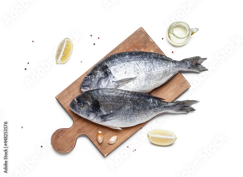 Fresh raw dorado fish on wo...