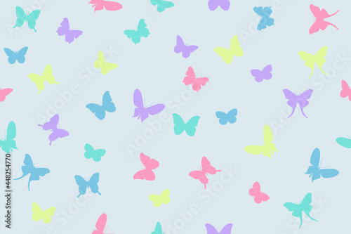 multicolored silhouettes of butterflies on a light background, seamless vector pattern  © ReflectedCrafts