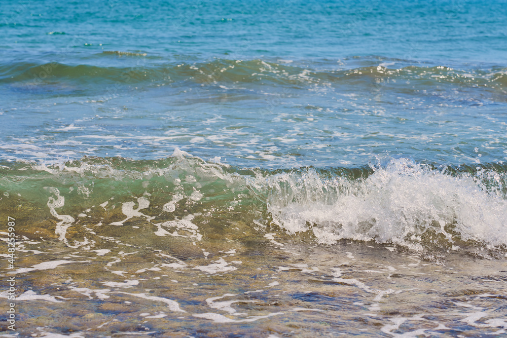 Waves with foam on Aegean sea coast in Crete Greece. Waves with foam on Aegean sea coast in Crete Greece.