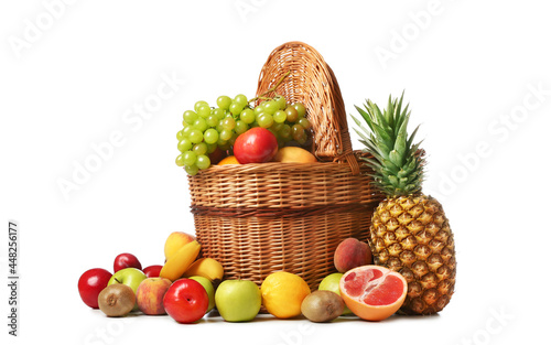 Fototapeta Naklejka Na Ścianę i Meble -  Basket with fresh fruits on white background
