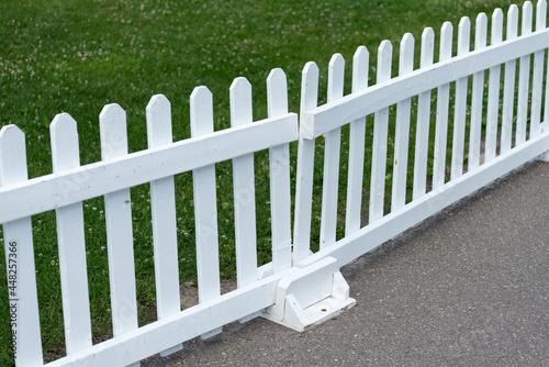 white fence with grass