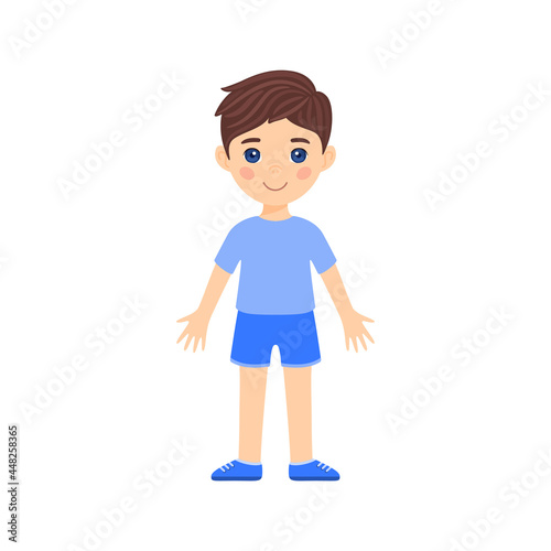 Cute Brunette cartoon boy is standing in clothes and shoes. Caucasian child with blue eyes and smiles. Happy isolated little schoolboy. Flat color style. White background. Vector illustration.