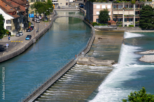 River Aare at Bern, capital of Switzerland, with open watergates because of high water. Photo taken July 29th, 2021, Bern, Switzerland.