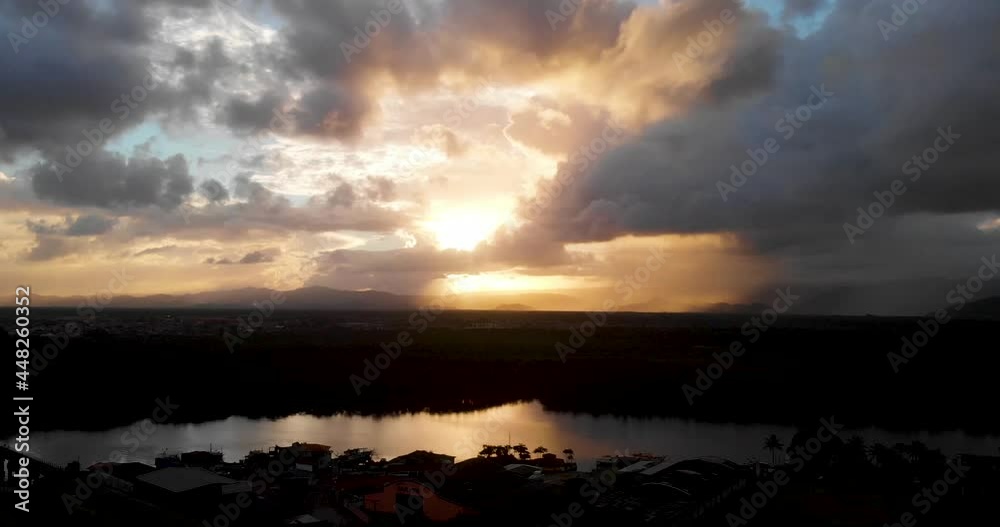 Stunning sunset on outskirts of Itanhaem, Brazil. Aerial descending Stunning sunset on outskirts of Itanhaem, Brazil. Aerial descending