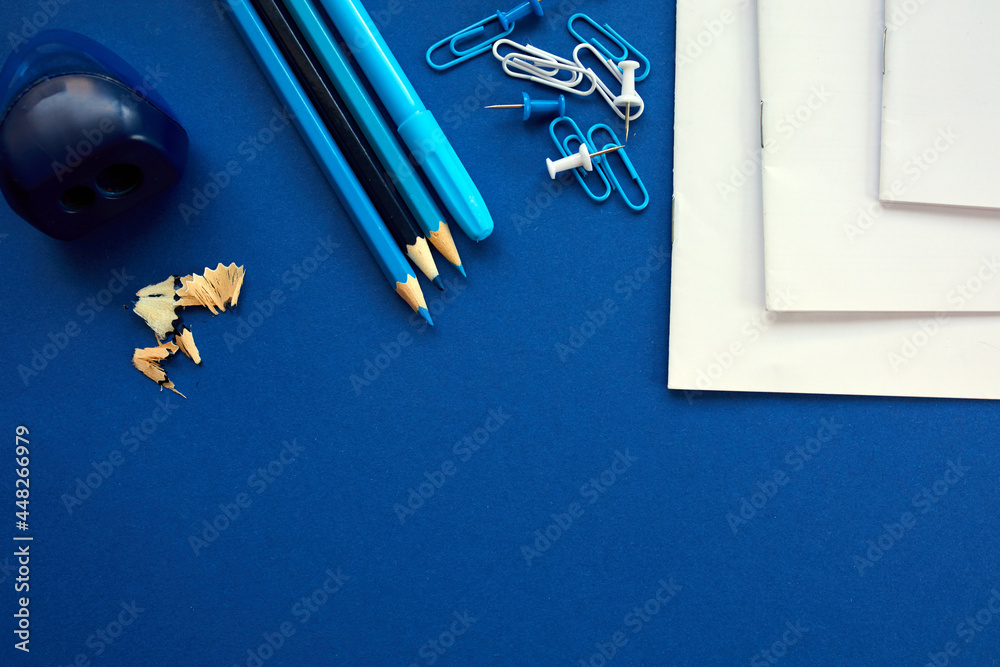 Blue Flat lay Back to school concept, School and office supplies on with copy space
