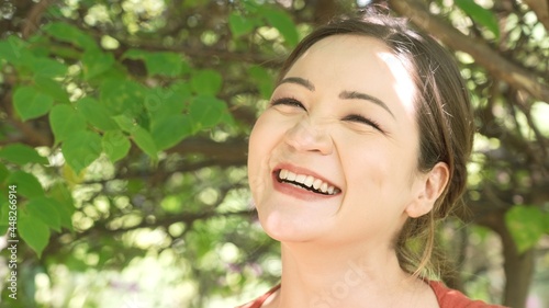 Quadro su tela Close-up of a happily smiling girl enjoying a vacation in the countryside