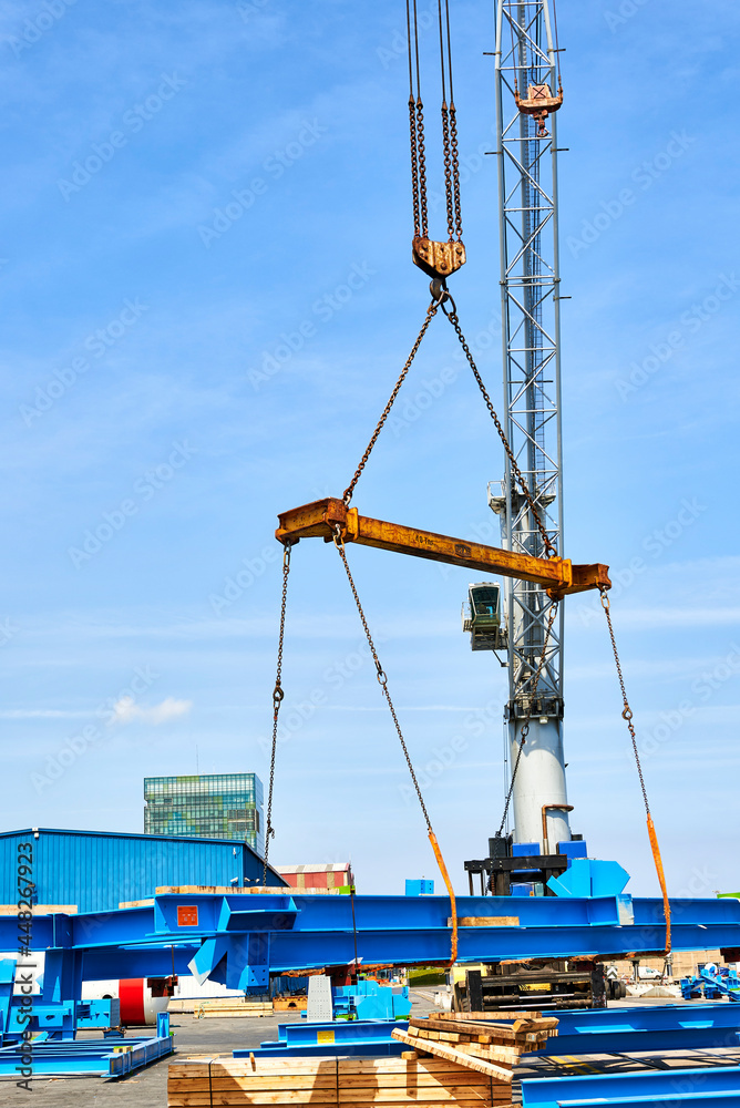 Fototapeta premium Crane loading a steel structure