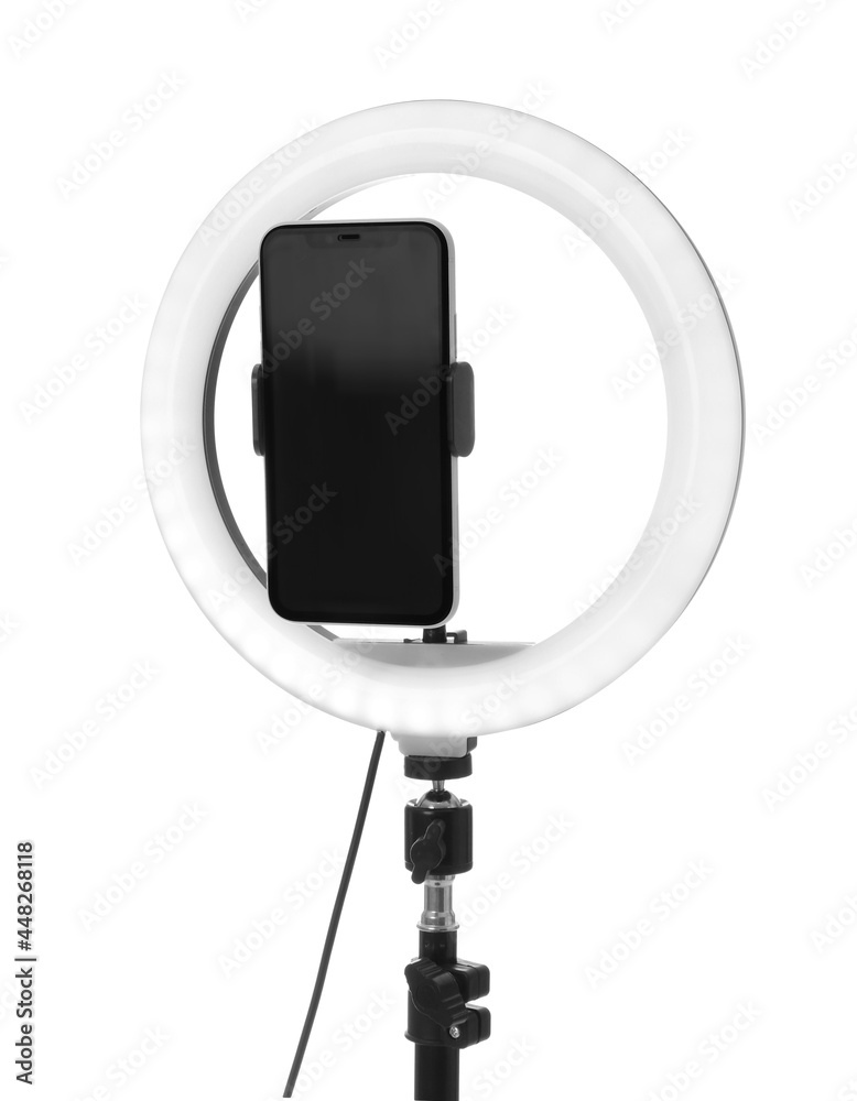 Tripod with ring light and smartphone isolated on white Tripod with ring light and smartphone isolated on white