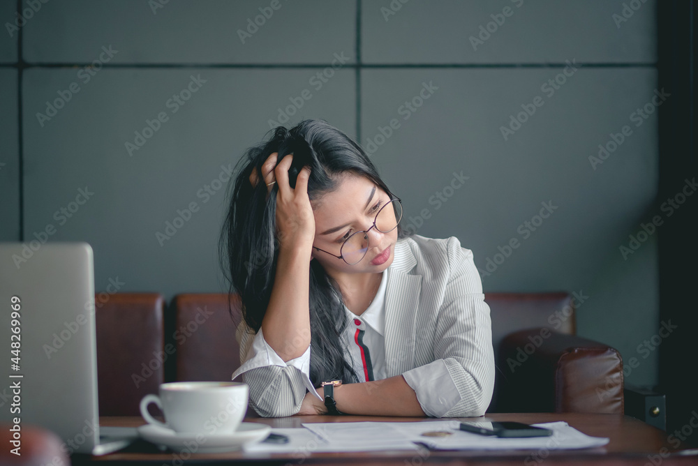 business woman she is stressed Because of the epidemic, the company's sales declined. business woman she is stressed Because of the epidemic, the company's sales declined.