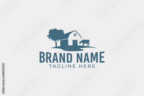 Carta da parati a simple farming logo with barn and cow images in a wide field