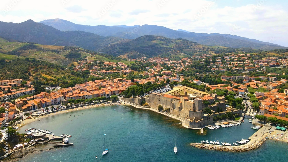Aerial view of the city of Collioure and Massif des Albères on the Côte Vermeille in Pyrénées-Orientales - France