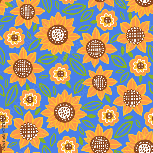 Seamless pattern with sunflower on blue background.
