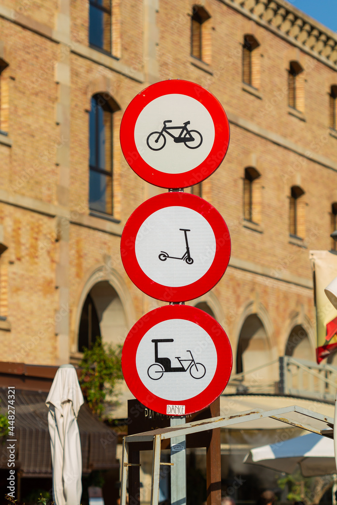 Sign prohibiting the passage of bicycles, scooters and tricycles on the promenade. Sign prohibiting the passage of bicycles, scooters and tricycles on the promenade.
