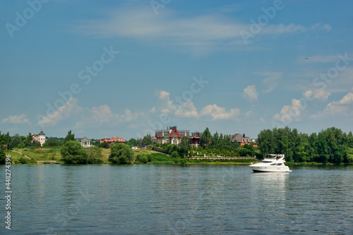 View of the embankment of the Klyazmensky reservoir, river walk along the Moscow water channel, Russia