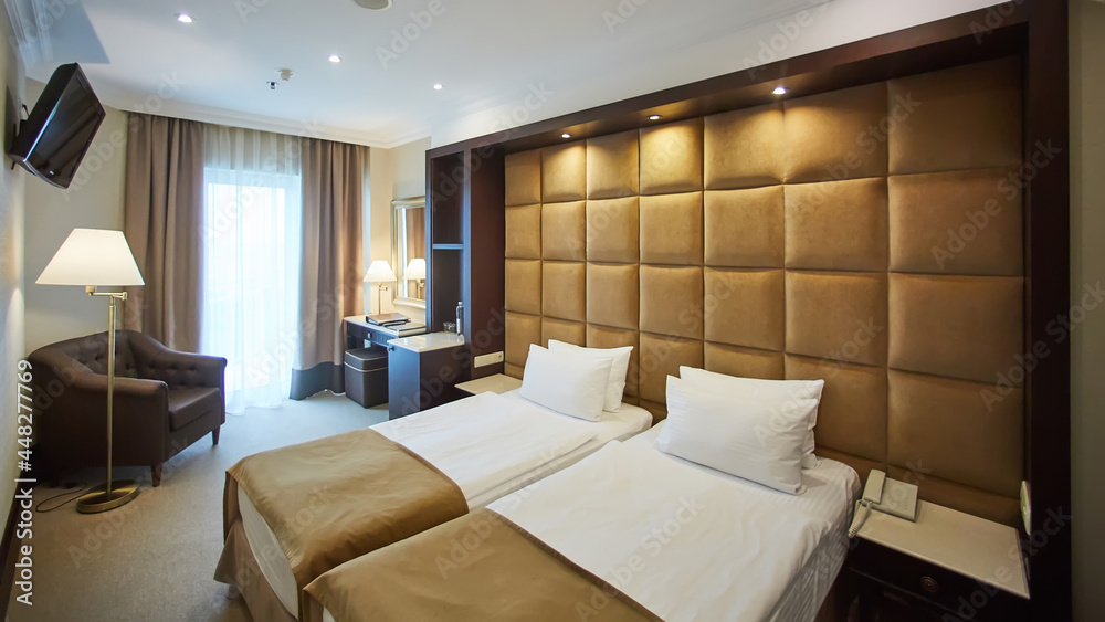 Two beds in a hotel room. Interior design Two beds in a hotel room. Interior design