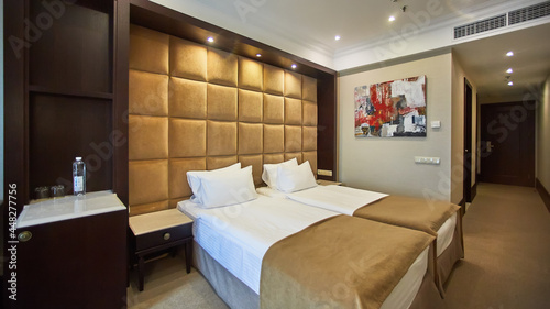 Two beds in a hotel room. Interior design © sarymsakov.com