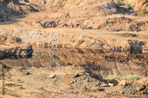 La Union Mining Park and ocher-tinted water lake