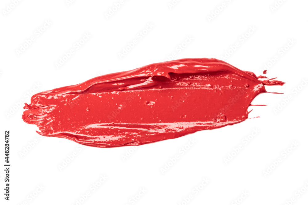 Red lipstick mark on white background. Lip gloss smear. Products for makeup and skin care. Beauty cosmetics. Closeup. Isolated. Red lipstick mark on white background. Lip gloss smear. Products for makeup and skin care. Beauty cosmetics. Closeup. Isolated.